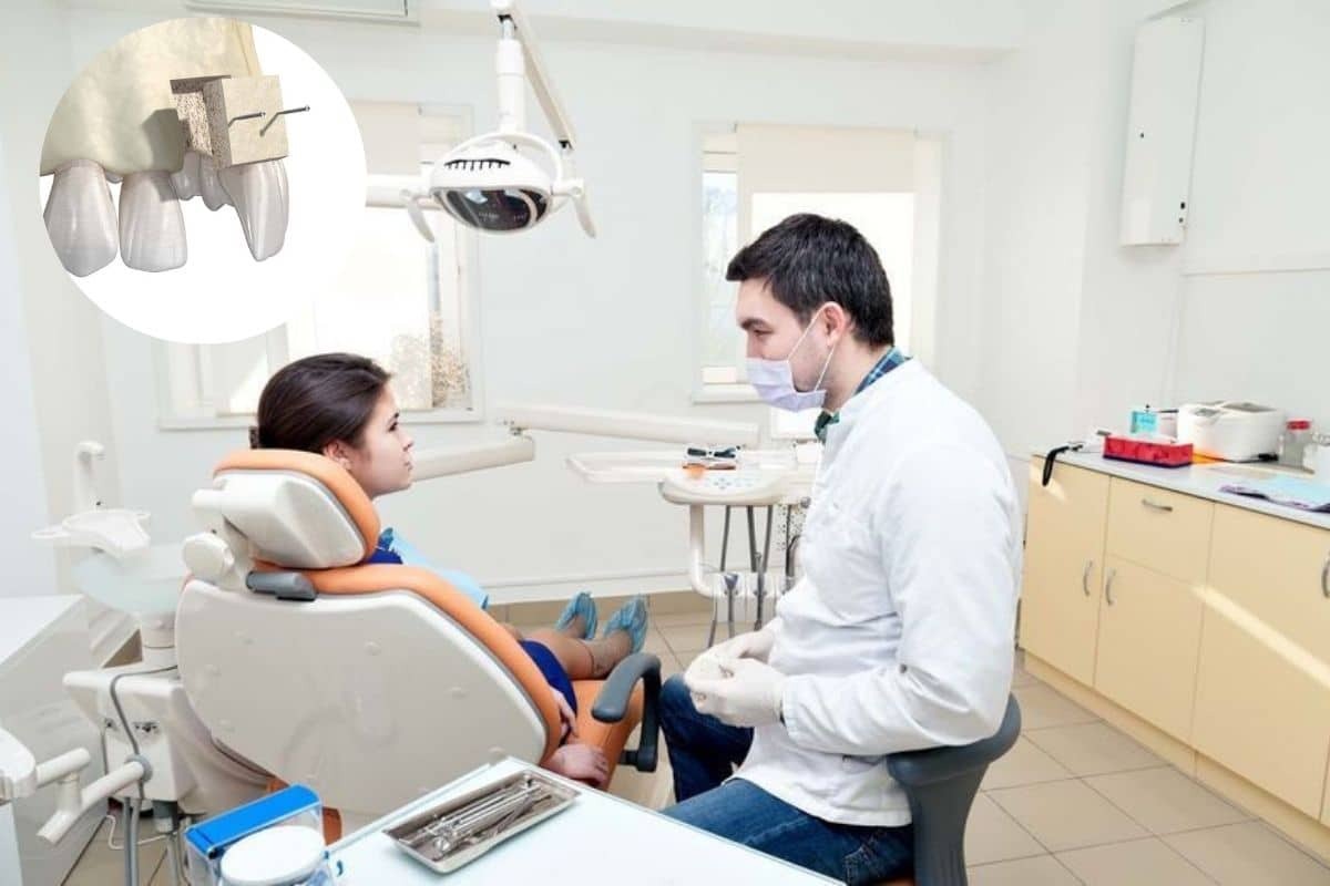 Dentist consulting with patient in Phoenix dental office about ridge augmentation before implant surgery.